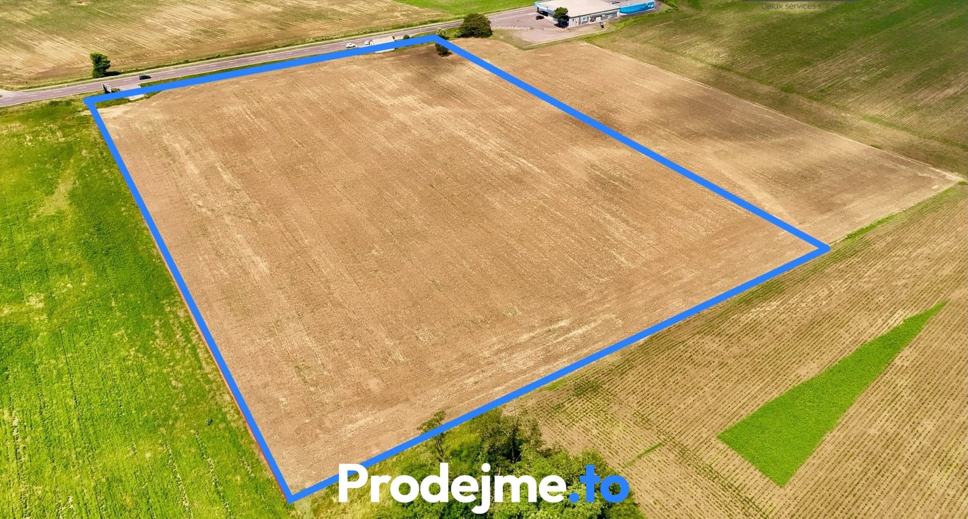 Prodej komerčního pozemku 35 000 m² - Hevlín